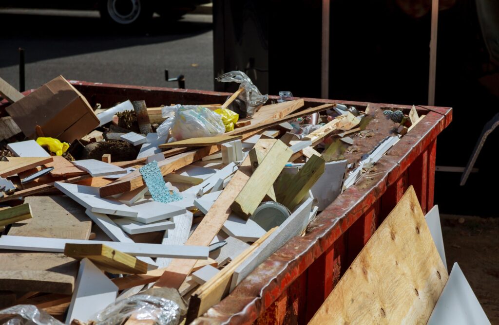 Dumpsters being full with garbage container trash